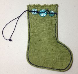 Green stocking ornament made by Lisa C.